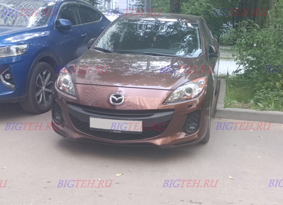 Вид спереди. Замена аккумулятора на Mazda 3 (BL) бензин 1.6 (105 л.с.) 2009-2011