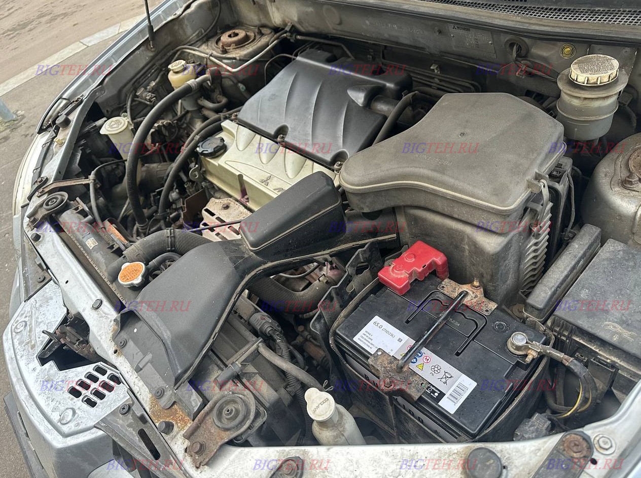 Новый акб. Замена аккумулятора на Mitsubishi Outlander I бензин 2.0 (136/202 л.с.) 2002 – 2008 Новый акб. Замена аккумулятора на Mitsubishi Outlander I бензин 2.0 (136/202 л.с.) 2002 – 2008